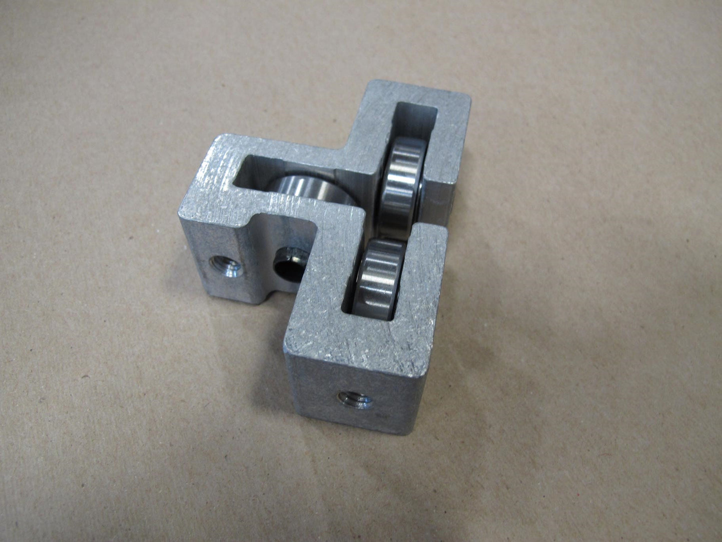 S126.
Guide Block Assembly - Film Carriage