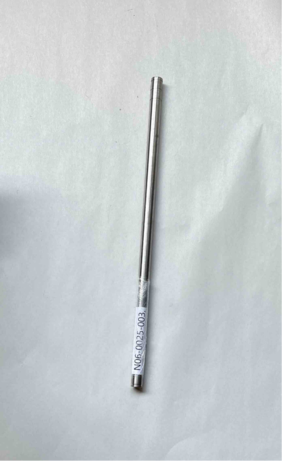N06-0025-003. 

Shaft  N06-0025-003. 